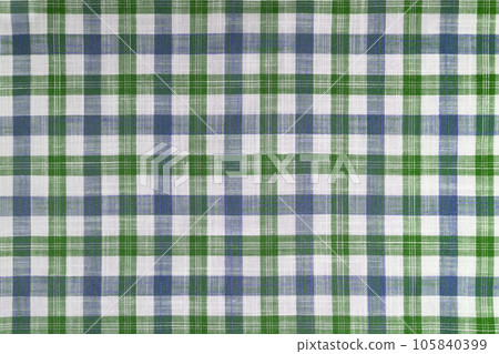 Green and blue checkered texture fabric, tartan pattern background. Green and blue checkered texture fabric, tartan pattern background. 105840399