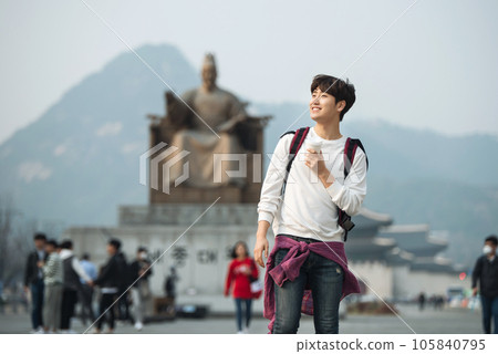 A young man traveling in Seoul, South Korea, with a backpack 105840795