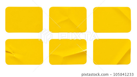 Yellow plastic sticker label isolated on white background Yellow plastic sticker label isolated on white background 105841233