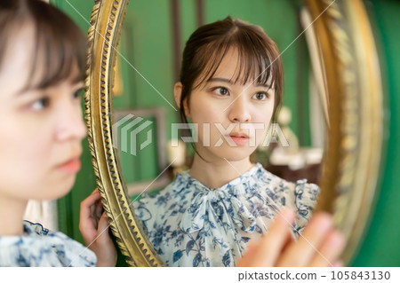 young woman in the mirror young woman in the mirror 105843130