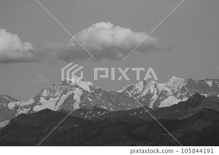 Black and white image of famous Mount Jungfrau. Black and white image of famous Mount Jungfrau. 105844191