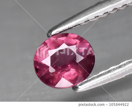 Natural gemstone pink sapphire isolated on white background Natural gemstone pink sapphire isolated on white background 105844922