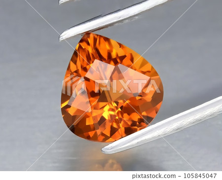 Natural gemstone yellow citrine on gray background Natural gemstone yellow citrine on gray background 105845047