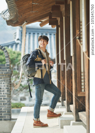 Young male college student traveling with a backpack in Korea 105845760