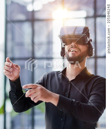 Businessman in virtual reality glasses or headset 105846248