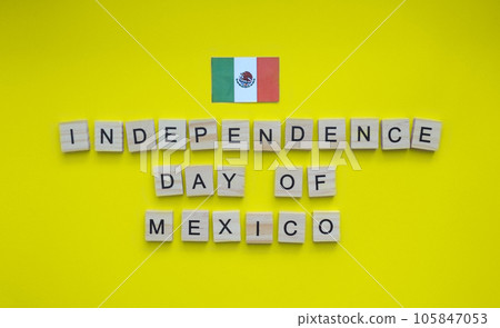 September 16, Independence Day of Mexico, flag of Mexico, minimalistic banner with the inscription in wooden letters on a yellow background 105847053