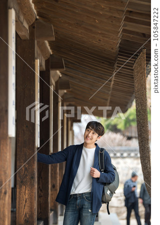 Young male college student traveling with a backpack in Korea 105847222