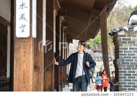 Young male college student traveling with a backpack in Korea 105847223