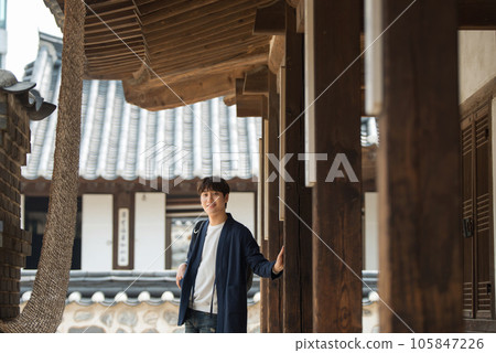 Young male college student traveling with a backpack in Korea 105847226