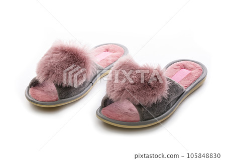 Pink women's slippers on a white background Pink women's slippers on a white background 105848830