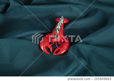 a punk style lobster and reveted spikes 105849683