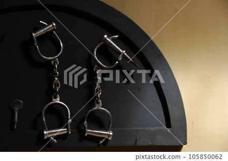 Police Handcuffs Hanging on the wall Police Handcuffs Hanging on the wall 105850062