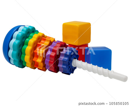 Multicolored children's pyramid with rotating disks and 3 cubes of red, yellow and blue standing one on top of the other. The toys are made of plastic. Insulated. PNG. Photo in high quality. 105850105