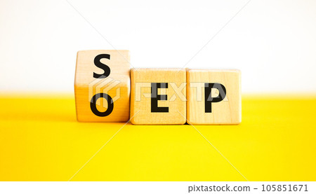 SEP or OEP symbol. Concept words OEP open enrollment period SEP special enrollment period. Beautiful yellow table white background. Medical open or special enrollment period concept. Copy space. 105851671
