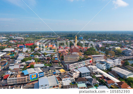 Aerial view of residential neighborhood roofs. Urban housing development from above. Top view. Real estate in Roi et province city, Thailand. Property real estate. 105852393