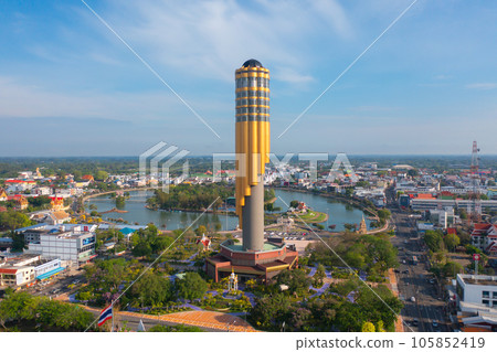 Aerial view of Roi Et tower, tourist attraction landmark. Urban housing development from above. Top view. Real estate in city, Thailand. Property real estate. 105852419