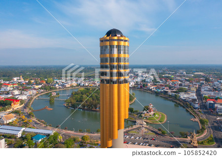Aerial view of Roi Et tower, tourist attraction landmark. Urban housing development from above. Top view. Real estate in city, Thailand. Property real estate. 105852420