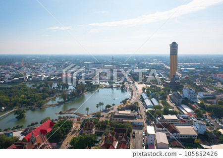 Aerial view of Roi Et tower, tourist attraction landmark. Urban housing development from above. Top view. Real estate in city, Thailand. Property real estate. 105852426