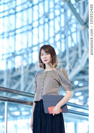 A young woman working 105852489