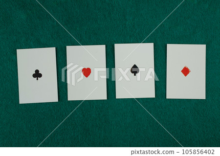 Old west era playing cards on gambling table. Four of a kind, aces. Old west era playing cards on gambling table. Four of a kind, aces. 105856402