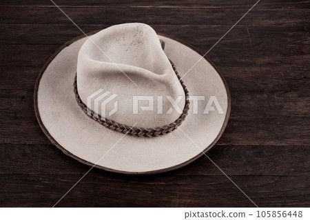 Old west hat on table. Top view. Old west hat on table. Top view. 105856448