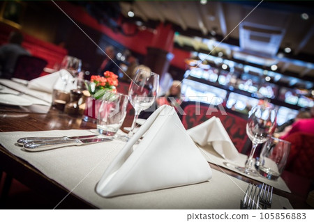 Fine table setting in luxurious restaurant 105856883