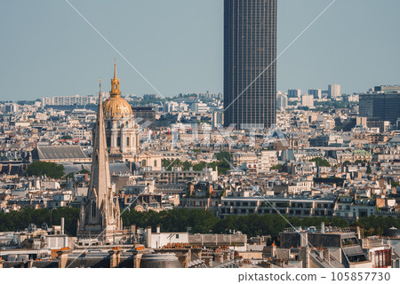 Oblique view of Paris cityscape from the Eiffel Tower on a sunny day with a blue sky. 105857730