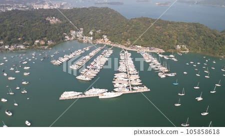 drone point of view of typhoon shelter which park full of yachts in sai kung drone point of view of typhoon shelter which park full of yachts in sai kung 105858618