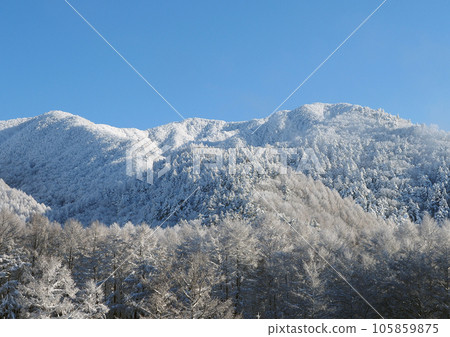 On the morning after a snowfall, the clear blue sky and the white snow cap of Mt. Kawageta in Fukushima Prefecture are impressive and beautiful. On the morning after a snowfall, the clear blue sky and the white snow cap of Mt. Kawageta in Fukushima Prefecture are impressive and beautiful. 105859875