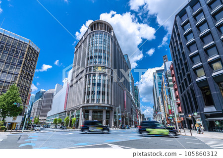 The cityscape of Tokyo, Japan, in front of Mitsukoshi-mae Station where the summer sky spreads out. Overlooking Nihonbashi Mitsukoshi The cityscape of Tokyo, Japan, in front of Mitsukoshi-mae Station where the summer sky spreads out. Overlooking Nihonbashi Mitsukoshi 105860312