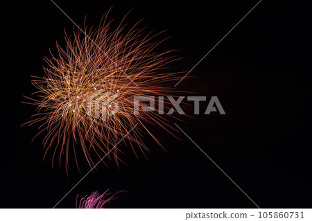 Fireworks shot with a telephoto lens Fireworks shot with a telephoto lens 105860731