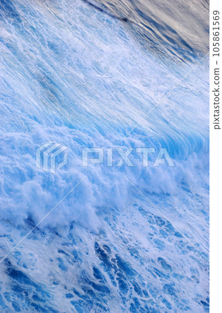 Blue sea marine ocean seascape tropical huge wave on blurred background. Seascape blue ocean white wave motion outdoor. Aqua marine huge wave sea summer background. Paradise turquoise water landscape Blue sea marine ocean seascape tropical huge wave on blurred background. Seascape blue ocean white wave motion outdoor. Aqua marine huge wave sea summer background. Paradise turquoise water landscape 105861569