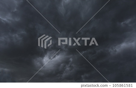 Dramatic dark storm rain clouds black sky background. Dark thunderstorm clouds rainny atmosphere. Meteorology danger windstorm disasters climate. Dark cloudscape storm disaster gloomy gray cloud sky Dramatic dark storm rain clouds black sky background. Dark thunderstorm clouds rainny atmosphere. Meteorology danger windstorm disasters climate. Dark cloudscape storm disaster gloomy gray cloud sky 105861581