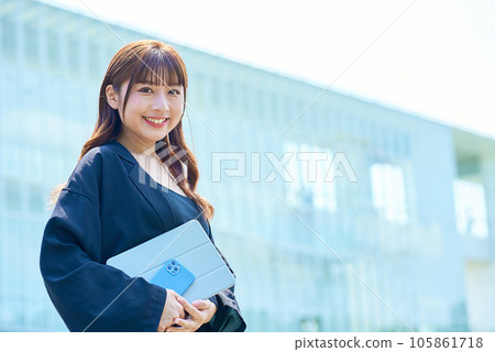 Young woman walking with a relaxed expression 105861718