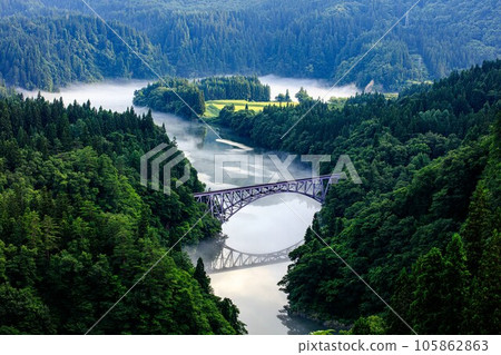 Tadami Line First Tadami River Bridge in summer with morning fog (Mishima Town, Fukushima Prefecture, mid-July) Tadami Line First Tadami River Bridge in summer with morning fog (Mishima Town, Fukushima Prefecture, mid-July) 105862863