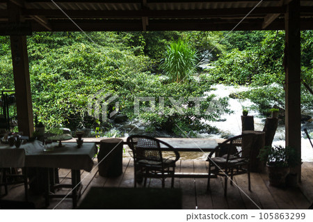 Riverside terrace and chairs and relaxation. Riverside terrace and chairs and relaxation. 105863299