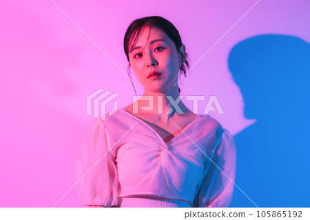 Female portrait with color lighting Female portrait with color lighting 105865192