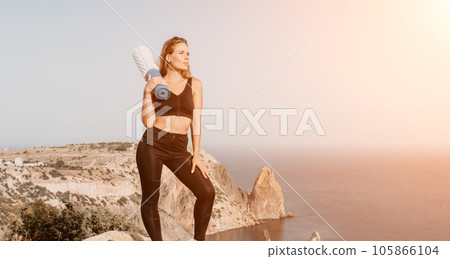 Fitness woman sea. Outdoor workout with fitness rubber bands in park over beach. Female fitness pilates yoga routine concept. Healthy lifestyle. Happy fit woman exercising with rubber band in park. 105866104