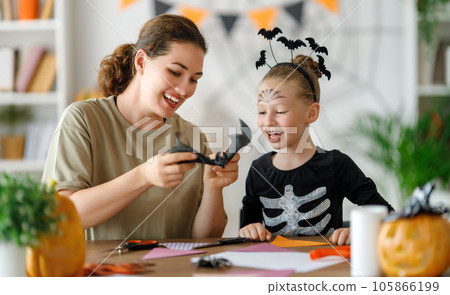 family preparing for Halloween family preparing for Halloween 105866199