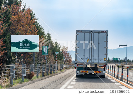 A truck driving near the Mt. Aizu Bandai sign on the Ban'etsu Expressway, Fukushima Prefecture 105866661