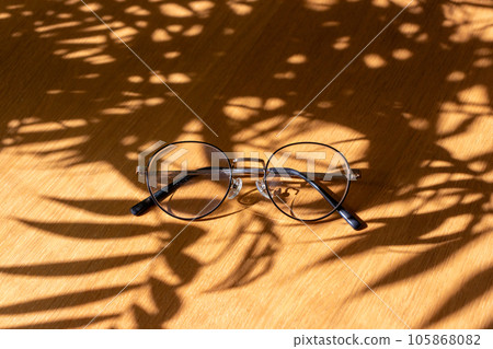 glasses on the table by the window glasses on the table by the window 105868082