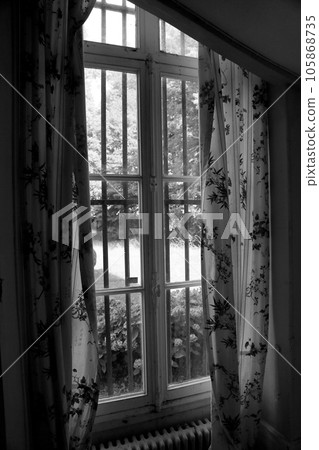 Beautiful wooden frame window in old building without people 105868735
