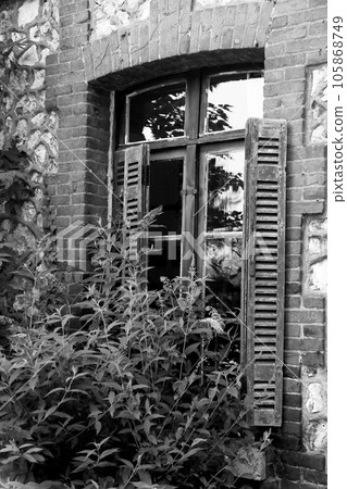 Beautiful wooden frame window in old building without people Beautiful wooden frame window in old building without people 105868749