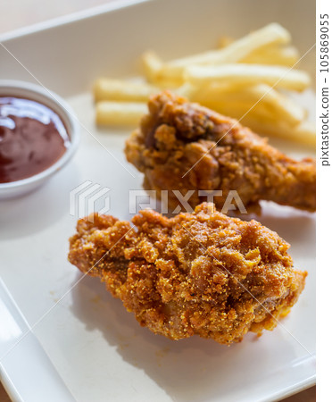 Roasted chicken legs on a white Plate 105869055