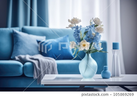 Modern blue living room design with sofa and furniture with flowers. Modern blue living room design with sofa and furniture with flowers. 105869269