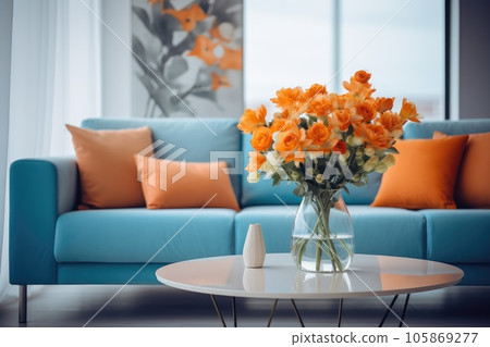 Modern blue and orange living room design with sofa and furniture with flowers. Modern blue and orange living room design with sofa and furniture with flowers. 105869277