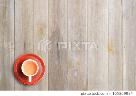 Cup of coffee on wooden table background Cup of coffee on wooden table background 105869984
