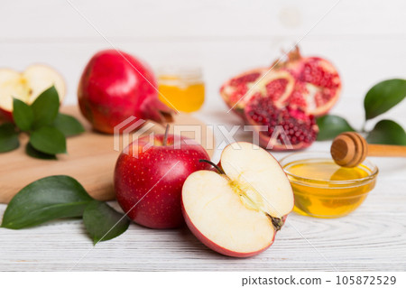 Flat lay composition with symbols jewish Rosh Hashanah holiday attributes on colored background, Rosh hashanah concept. New Year holiday Traditional. Top view with copy space 105872529