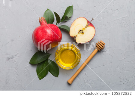 Flat lay composition with symbols jewish Rosh Hashanah holiday attributes on colored background, Rosh hashanah concept. New Year holiday Traditional. Top view with copy space 105872822