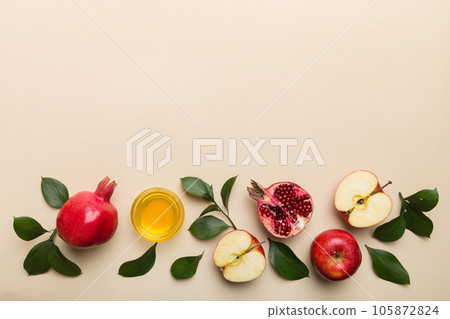 Flat lay composition with symbols jewish Rosh Hashanah holiday attributes on colored background, Rosh hashanah concept. New Year holiday Traditional. Top view with copy space 105872824